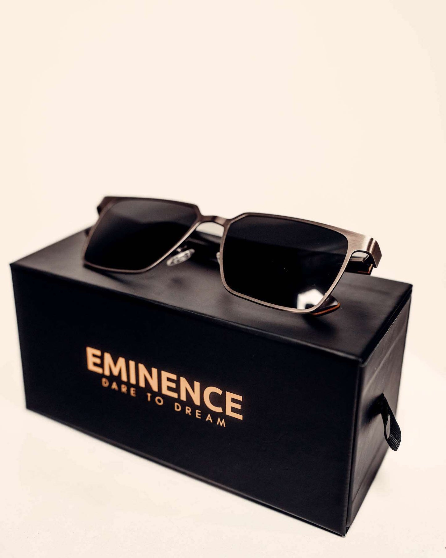 a pair of sunglasses sitting on top of a box